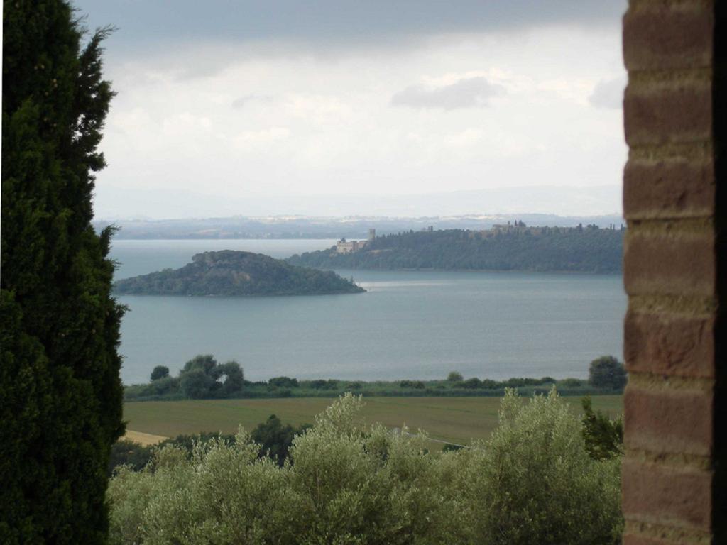 Antico Casale Tiravento Aparthotel Passignano sul Trasimeno Cameră foto